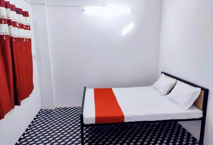 Spot On 80770j Hotel Relax Inn