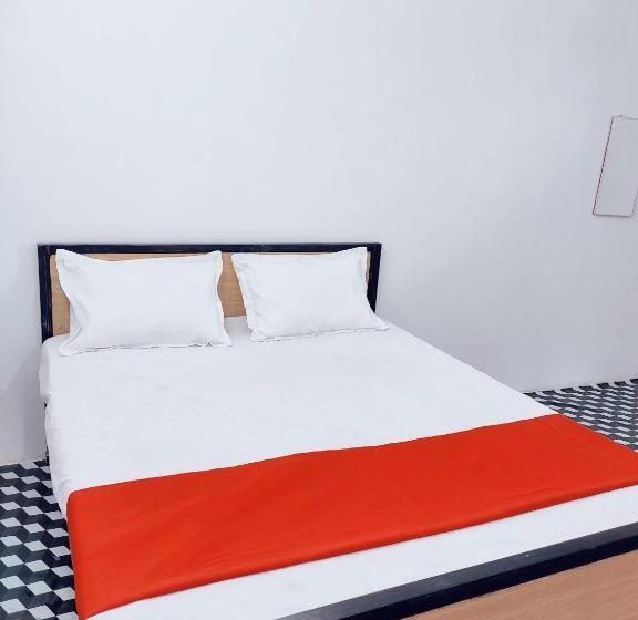 Spot On 80770j Hotel Relax Inn