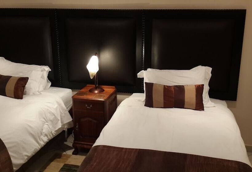 Pension (Hôtel basse catégorie) Magaliqua Guest House