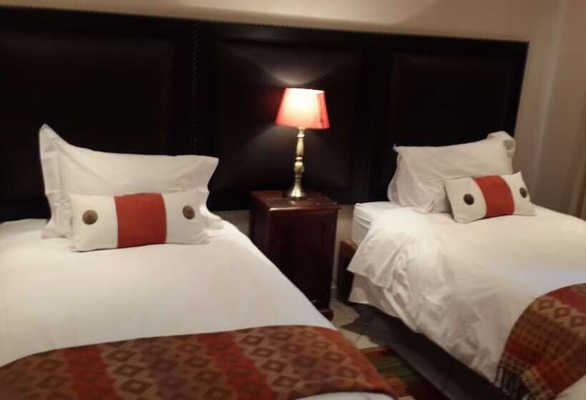 Pension (Hôtel basse catégorie) Magaliqua Guest House