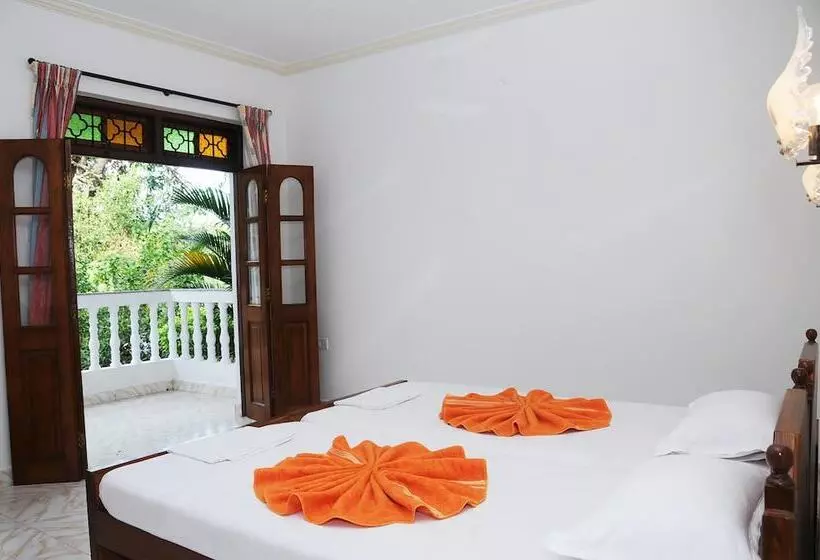 호텔 D'souza's Holiday Homes