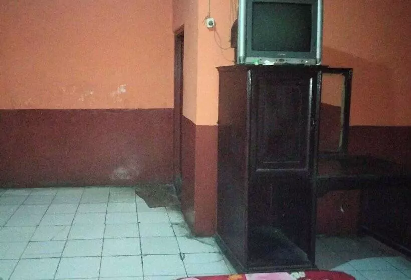 ホテル Spot On 92601 Penginapan Keluarga