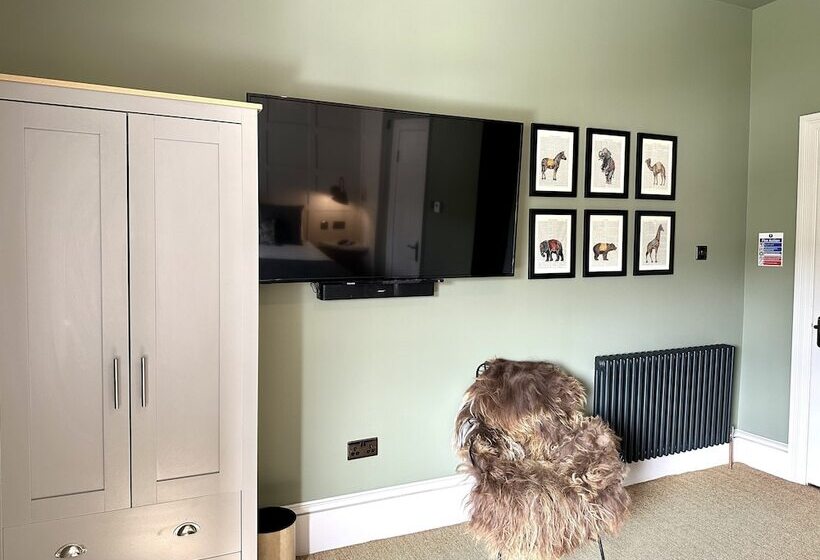 ホテル Rooms Above Sugar Boat