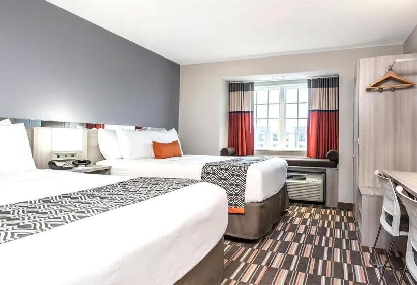 Отель Coratel Inn & Suites By Jasper Rochester