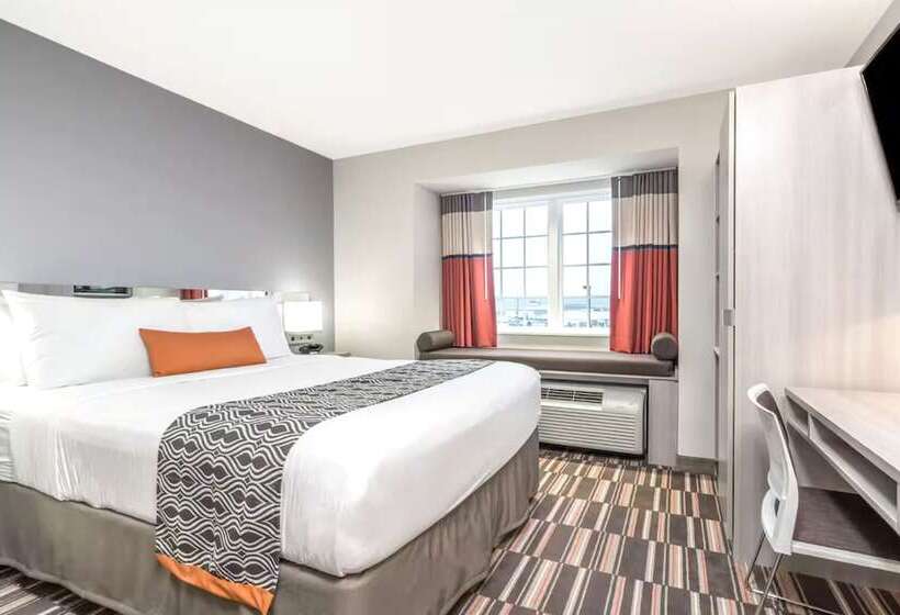 Отель Coratel Inn & Suites By Jasper Rochester