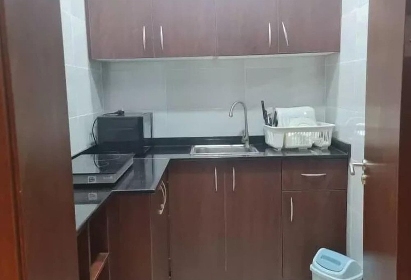 هتل Debbie S Suites And Apartments