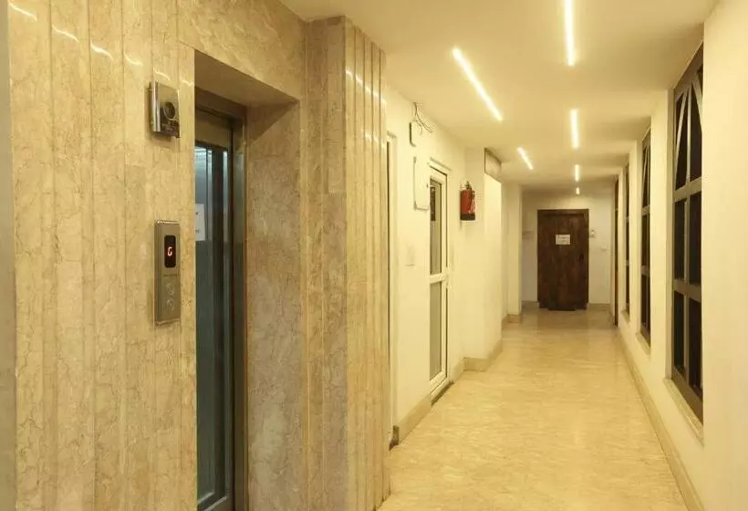 هتل Shoolin Suites By Delight Stay