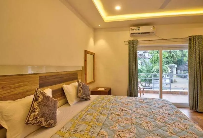 ホテル The Gr Managed By The Four Season Close To Candolim Beach