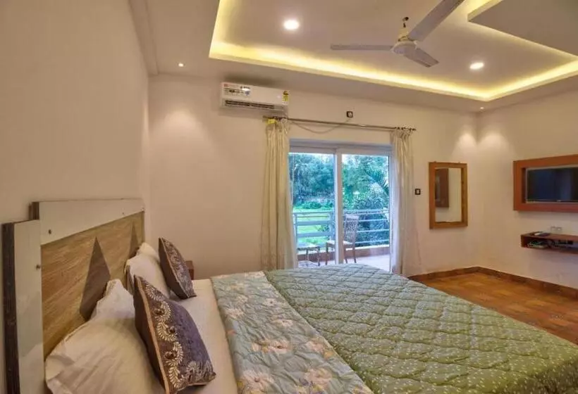 ホテル The Gr Managed By The Four Season Close To Candolim Beach