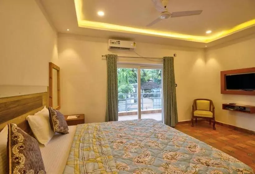 ホテル The Gr Managed By The Four Season Close To Candolim Beach