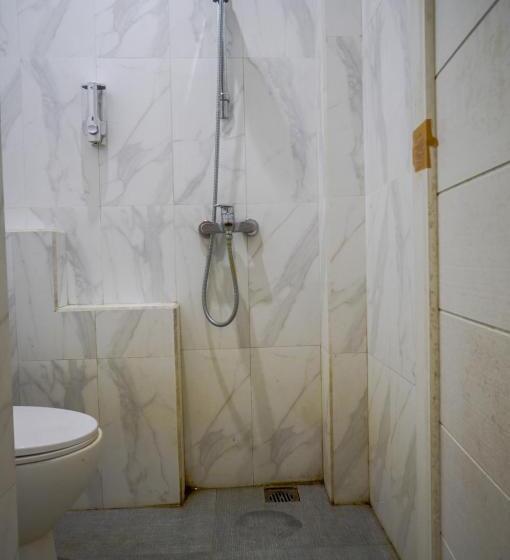 ホテル Oyo 93069 Penginapan Sumber Rizki