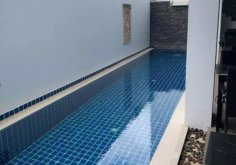 One World One Home Naiharn Hotel By Zuzu