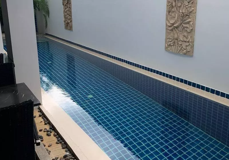 One World One Home Naiharn Hotel By Zuzu