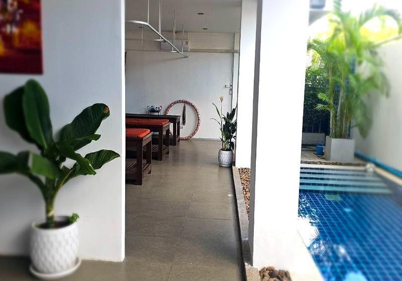 One World One Home Naiharn Hotel By Zuzu