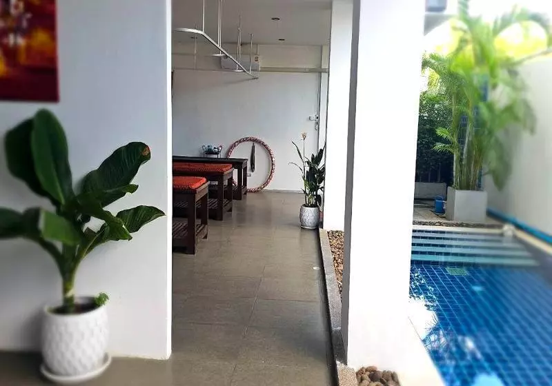 One World One Home Naiharn Hotel By Zuzu