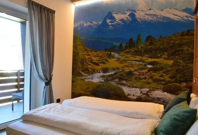 ペンション Aria Alpina Guest House Affittacamere