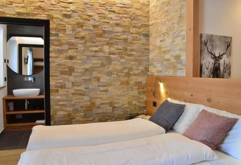 ペンション Aria Alpina Guest House Affittacamere