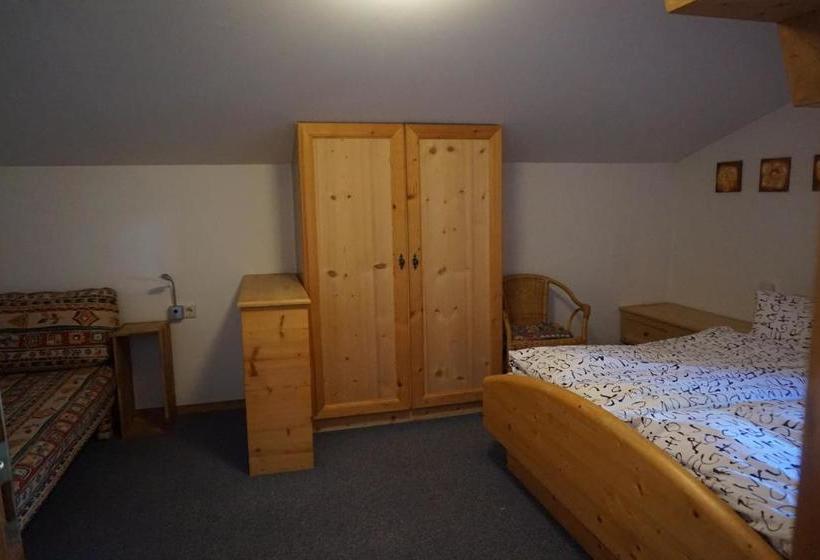 Отель Appartements Huber