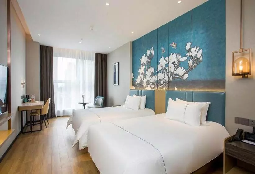 Magnotel Business Hotel Zhenjiang South Station Greenland Square