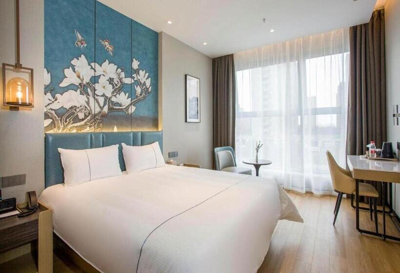 Magnotel Business Hotel Zhenjiang South Station Greenland Square