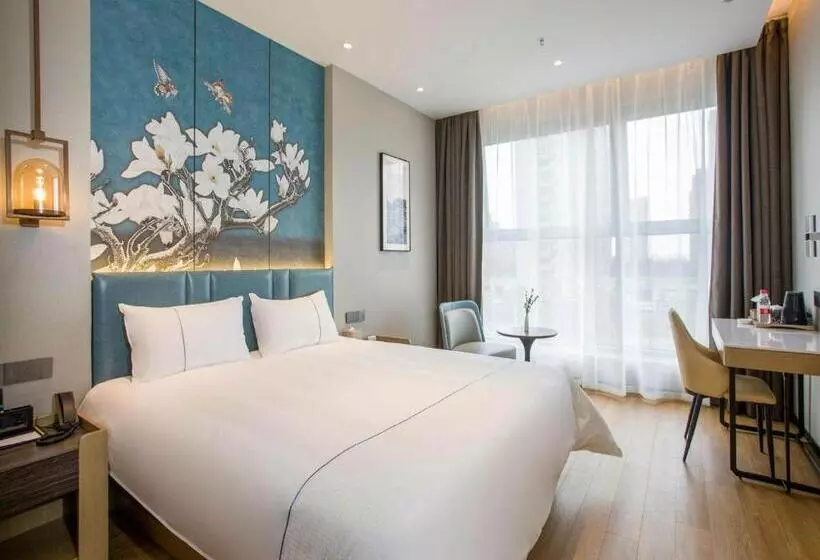 Magnotel Business Hotel Zhenjiang South Station Greenland Square