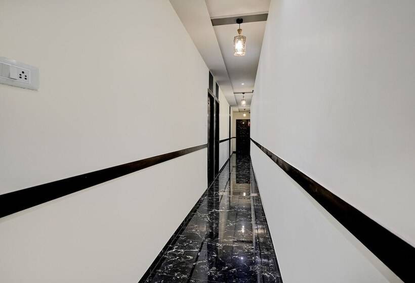 Отель Fabexpress Golden Sands Inn