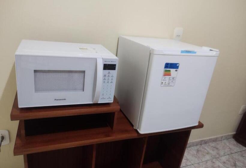 Pension (Hôtel basse catégorie) Quarto Confortavel Com Garagem