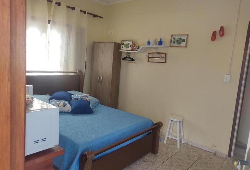 Pension (Hôtel basse catégorie) Quarto Confortavel Com Garagem