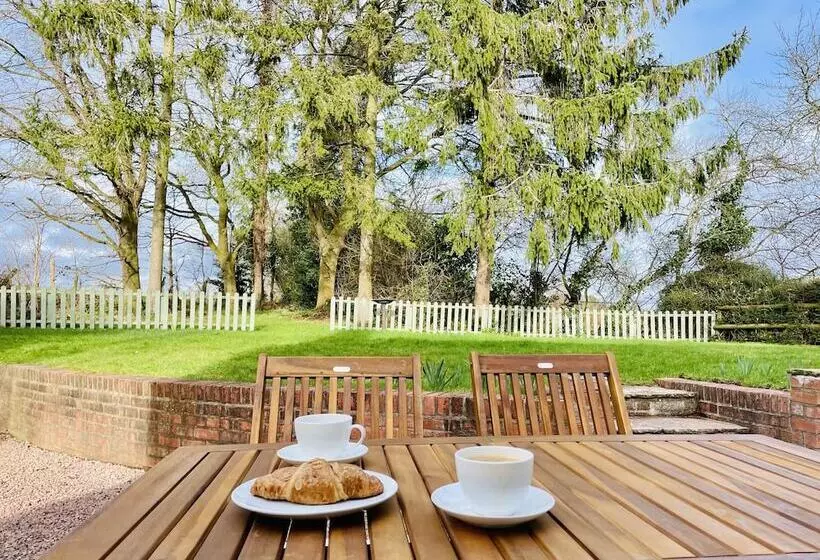 Log Burner And Beamed Ceilings King Size Bed