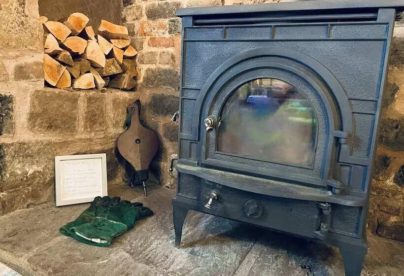 Log Burner And Beamed Ceilings King Size Bed