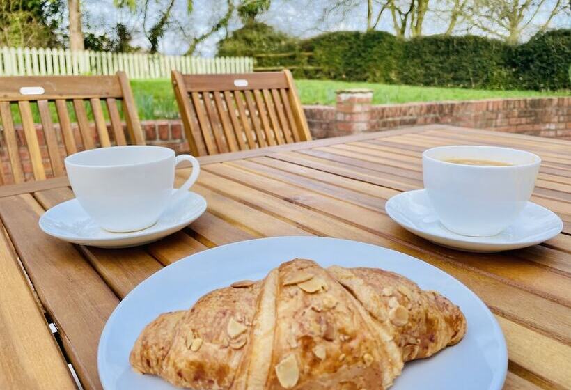 Log Burner And Beamed Ceilings King Size Bed