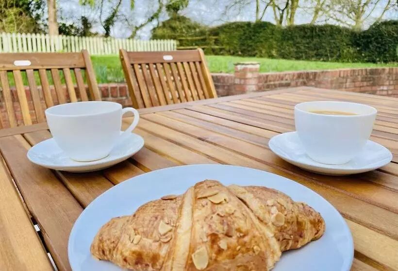 Log Burner And Beamed Ceilings King Size Bed