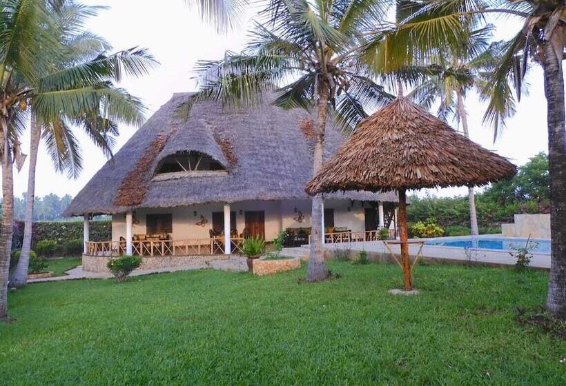 هتل Queen K Cottages At Chrystal Homes