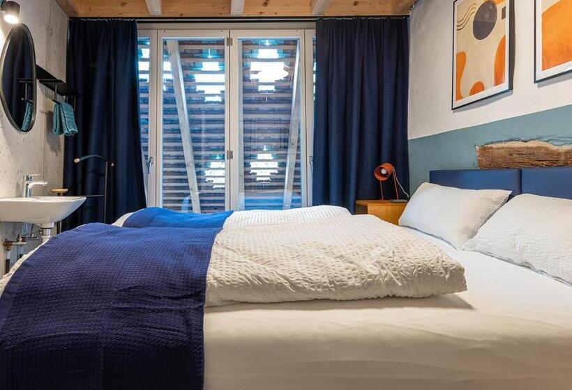 هاستل Ambrosia Hüsli