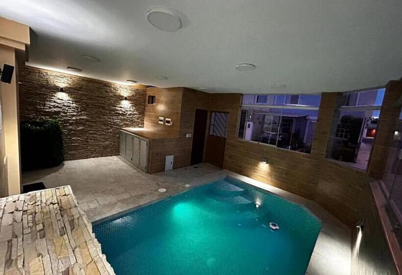 Pension Piscina Temperada   10 Personas