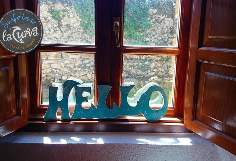 تختخواب و صبحانه La Curva Surfhouse   Hostel