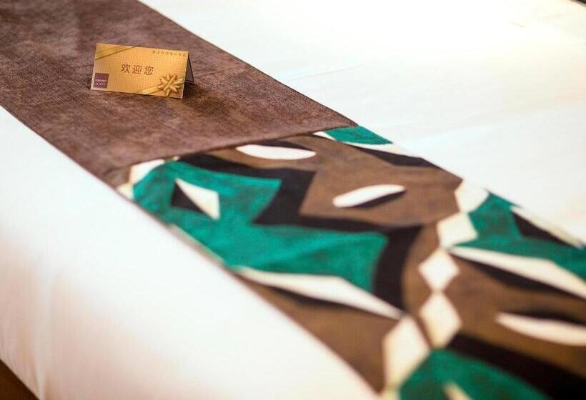 Отель James Joyce Coffetel Xinyang Municipal Government Railway Station