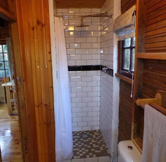 Retkeilymaja Woodlands Cottages & Camping