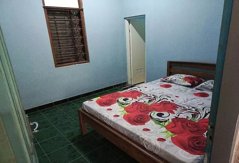 Spot On 94085 Hotel Agung