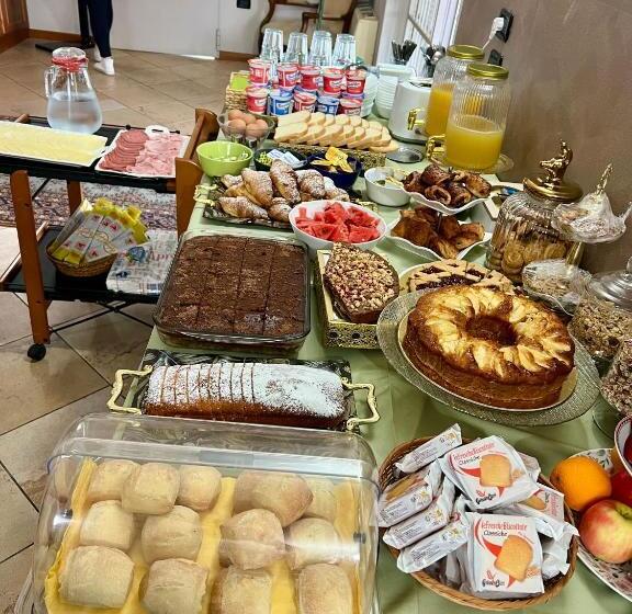 Отель Albergo Quatro Pini