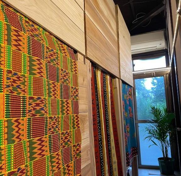 بنسيون 与論ゲストハウス ズッ友荘