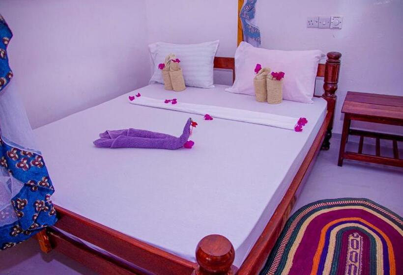 בית מלון כפרי Zanzi Rest Bungalow