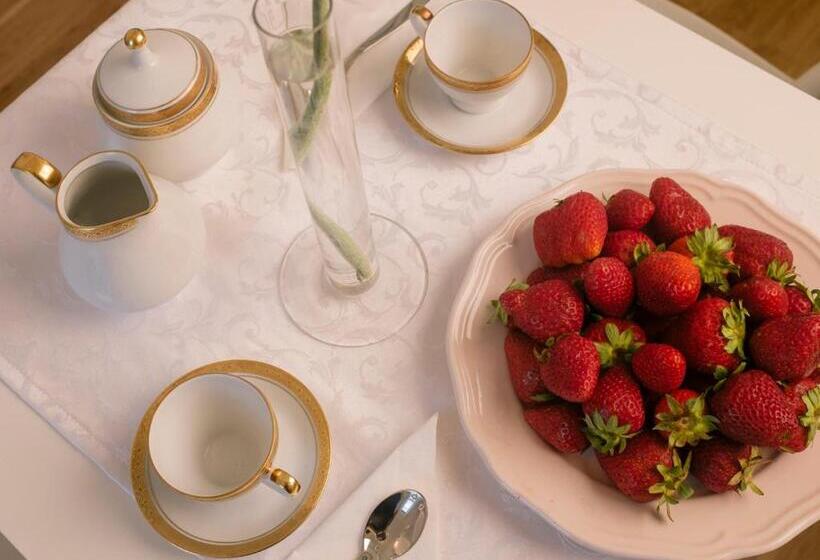 تختخواب و صبحانه Maison Fleurie