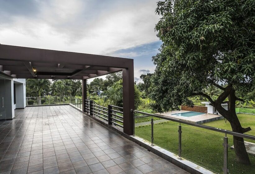 צימר Nadhiyoram River Retreat