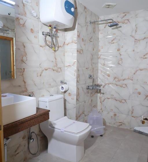 호텔 Hukam S Holiday Home Kasol