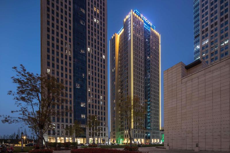 호텔 Ramada Encore By Wyndham Yangzhoudong Railway Station