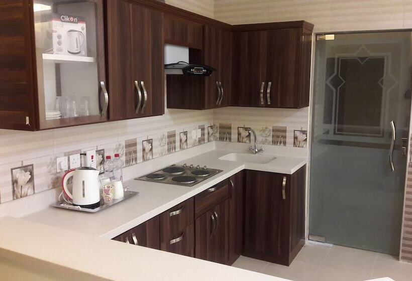 Отель Ashbilia Suites