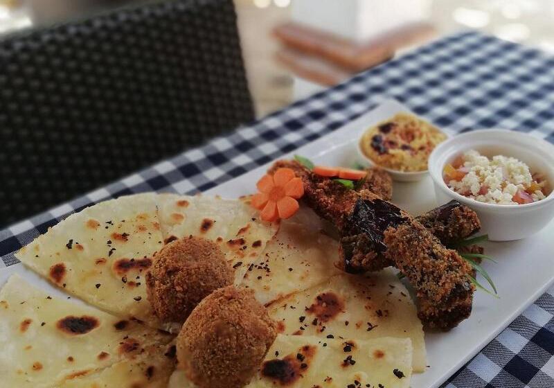 Hotel Evolution Dive And Beach Resort