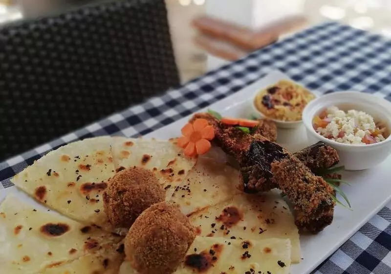 Hotel Evolution Dive And Beach Resort