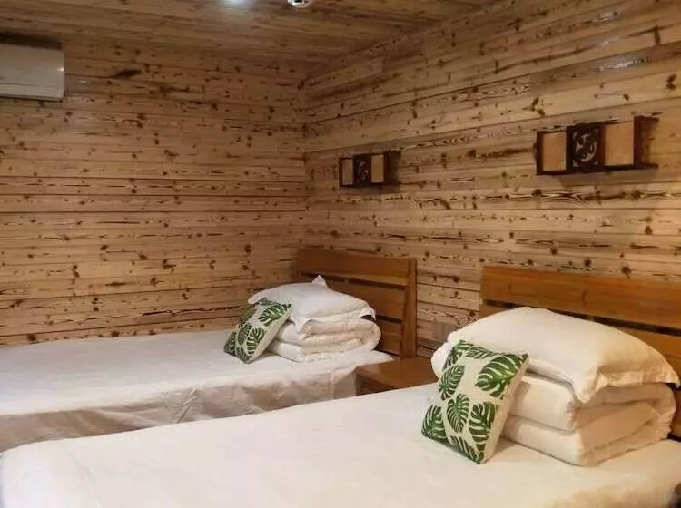 Nanjing Tulou Qingdelou Inn